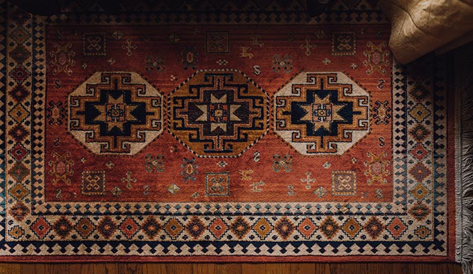 Traditional oriental area rug for fire retardancy treatment