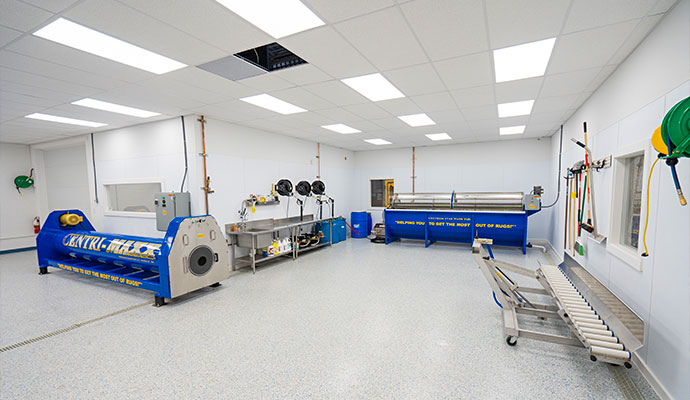 Modern rug cleaning facility and specialized equipment