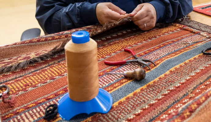 Professional rug reweaving service