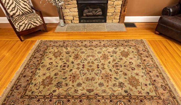 Rug placed on the floor after color correction service