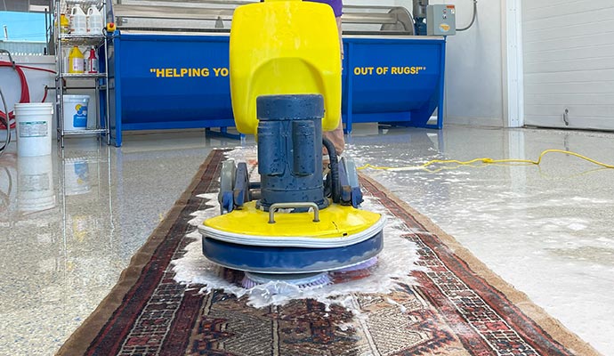 Rug washing with equipment