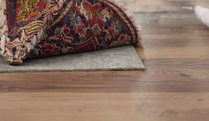 rug pad on wooden floor