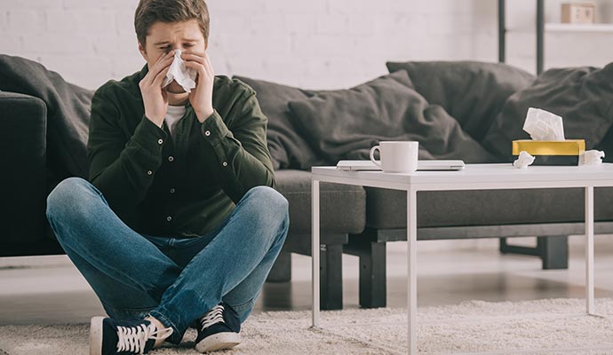 A person is having allergy issues