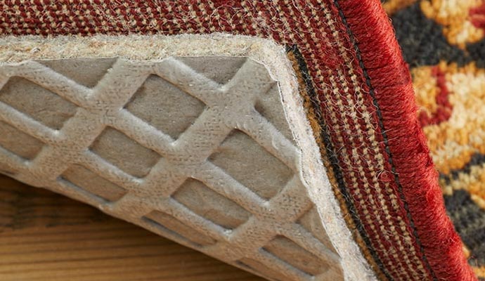 High-quality rug pads installed under carpet