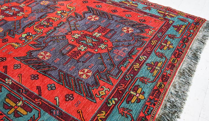 Colorful traditional rug with intricate patterns